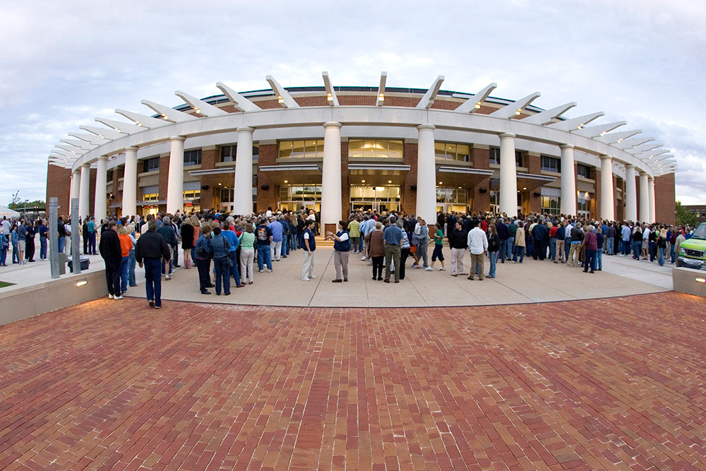 People standing inline in front of John Paul Jones Arena